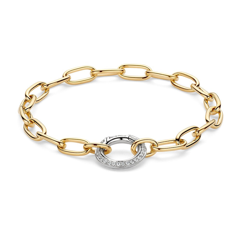 Pulsera de eslabones en oro amarillo con cierre de resorte en oro blanco y diamantes.