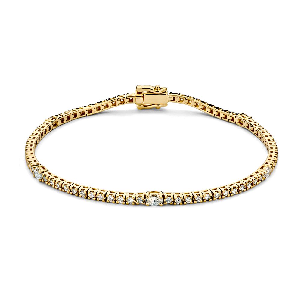 Pulsera de tenis de oro amarillo con diamantes brillantes y tallados en pera, 14 quilates.