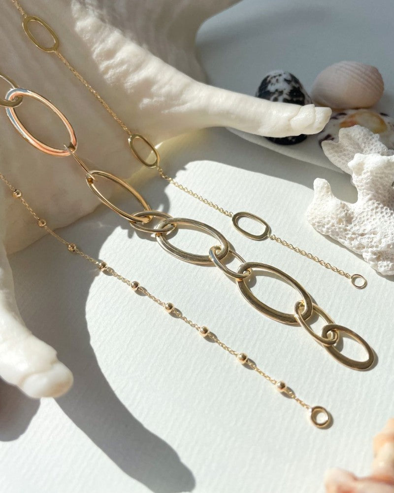 Pulsera de oro amarillo – 14 quilates de oro con óvalos calados