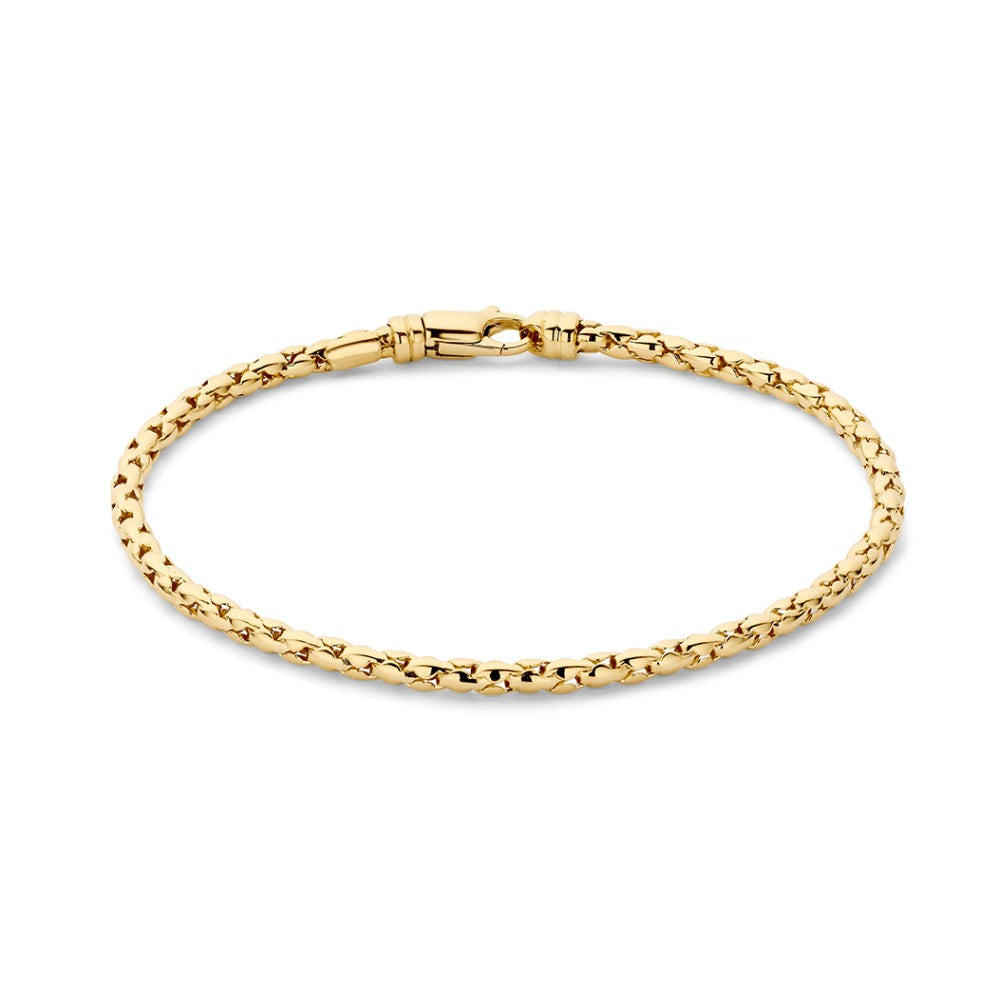Pulsera de oro amarillo con diseño trenzado y cierre de seguridad.
