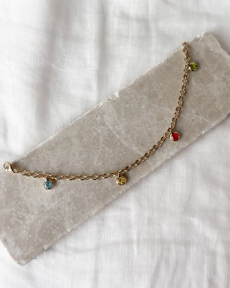 Pulsera de oro amarillo con charms de piedras preciosas – oro de 14 quilates – topacio azul, peridoto, cuarzo limón y ópalo de fuego