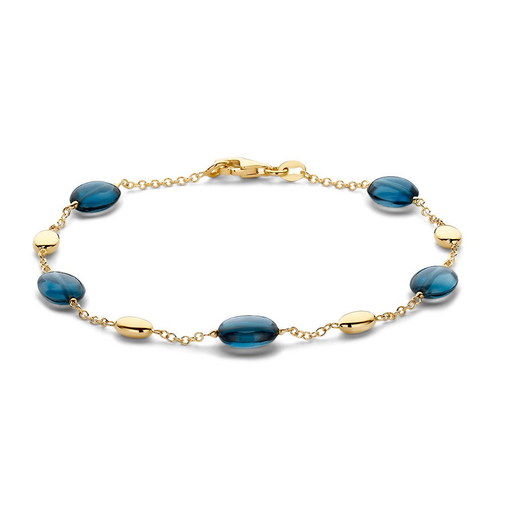 Pulsera de oro amarillo de 14 quilates con topacios azules, de 19 cm y 7 mm de ancho.