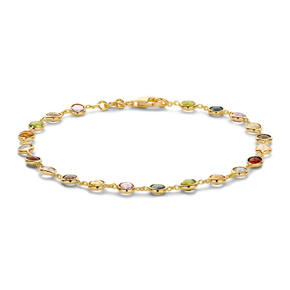 Pulsera de oro amarillo con piedras preciosas de colores en forma ovalada.
