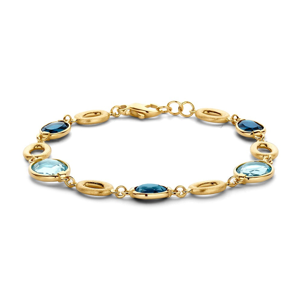 Pulsera de oro amarillo con piedras preciosas en tonos azules y verdes.