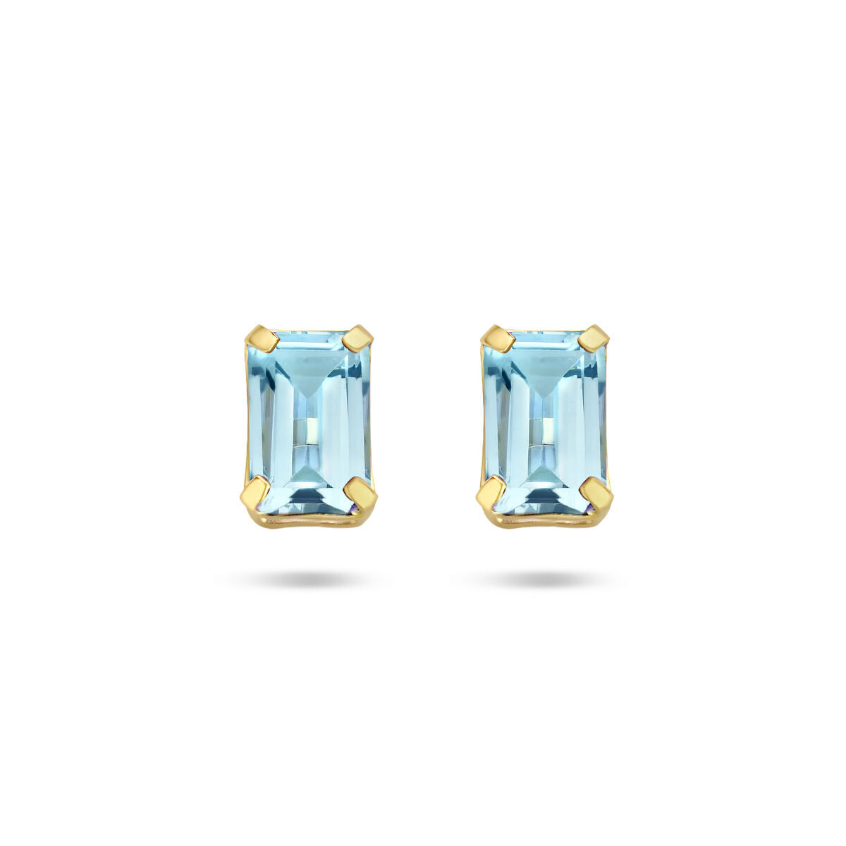 Pendientes de topacio azul en forma rectangular con montura de oro amarillo de 14 quilates.
