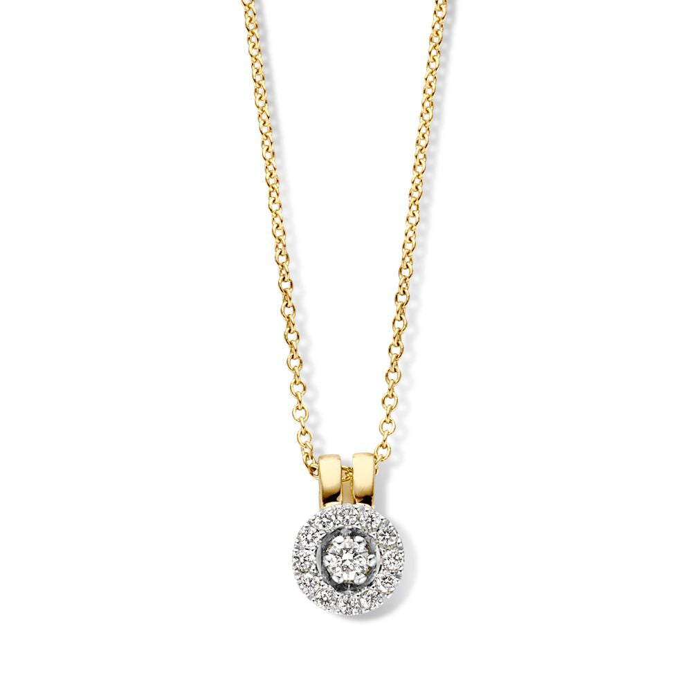 Colgante de diamantes en forma de flor sobre cadena de eslabones de ancla dorada.