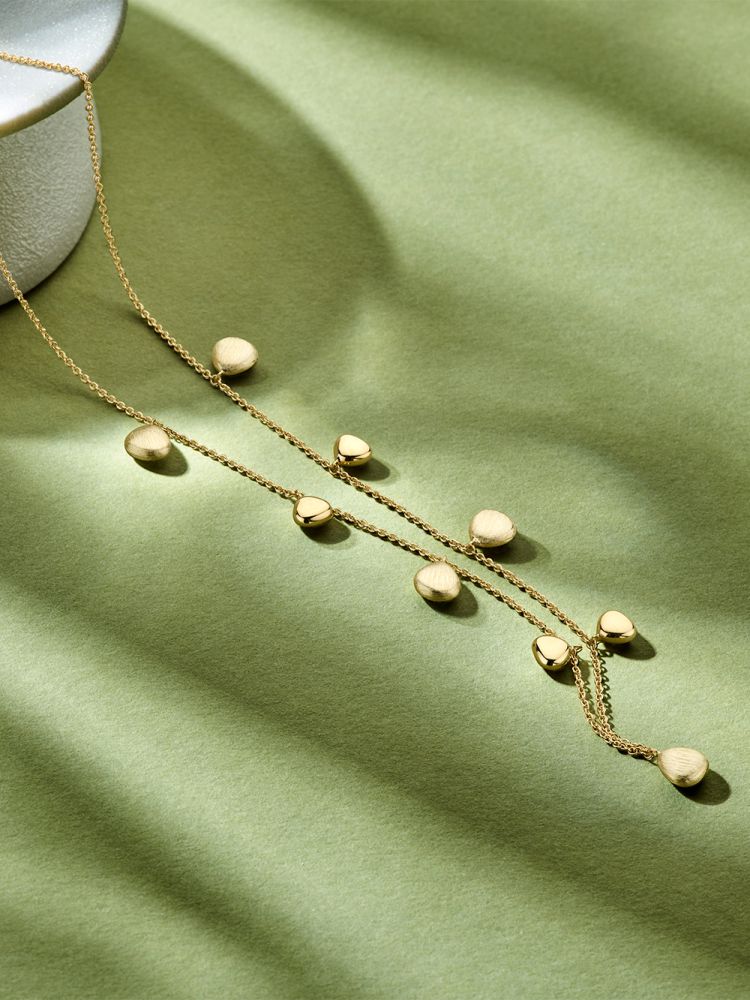 Collar de oro amarillo de 14K con elementos ovales - Joya juguetona y elegante de mujer