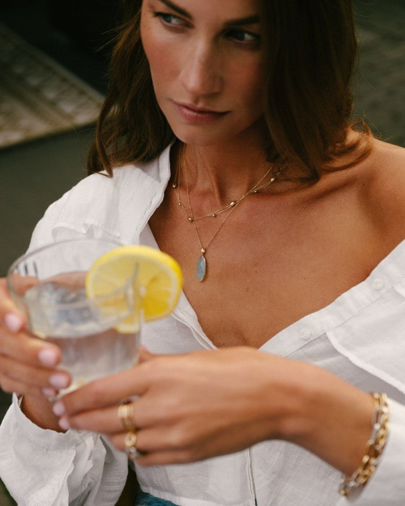 Collar de oro amarillo con eslabones de ancla y colgante ovalado de aguamarina – 14 quilates de oro