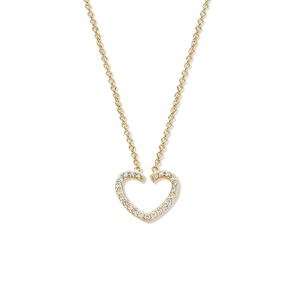 Collar de oro amarillo con colgante en forma de corazón y diamantes.