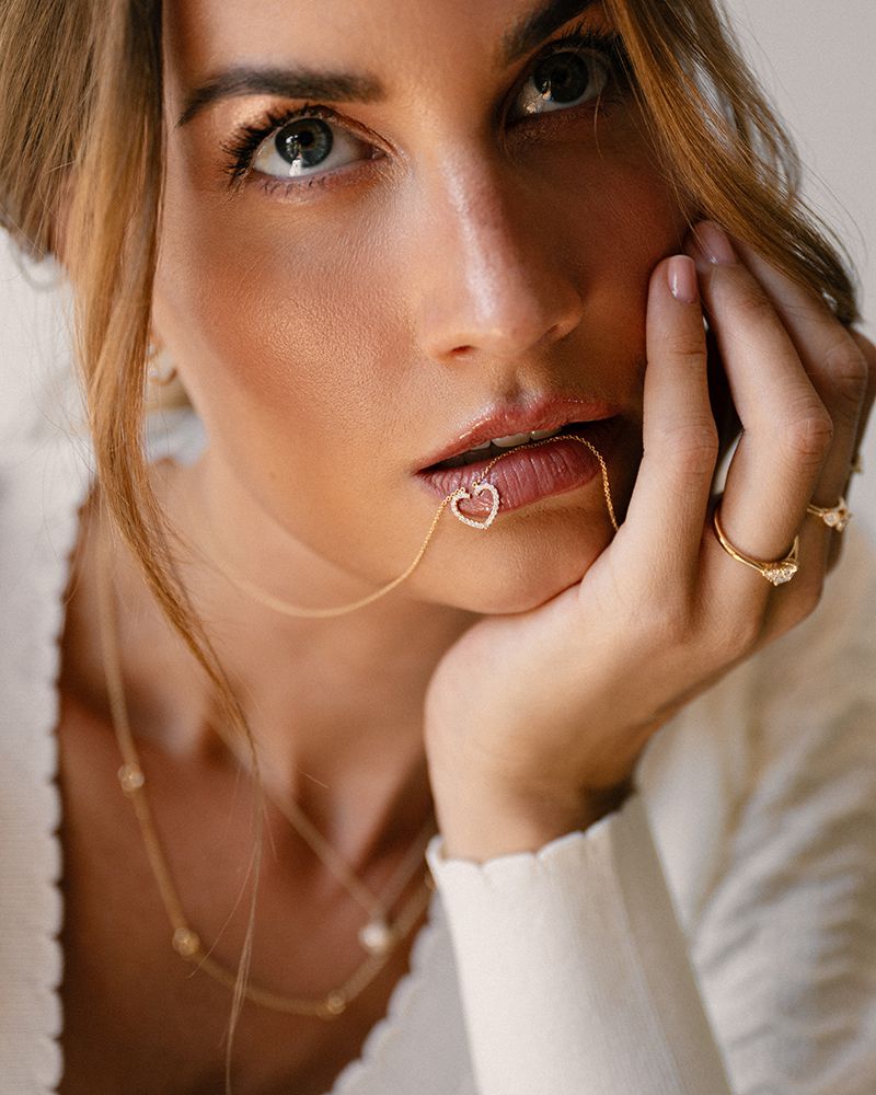 Collar de oro amarillo con colgante de corazones y diamante - 14 quilates