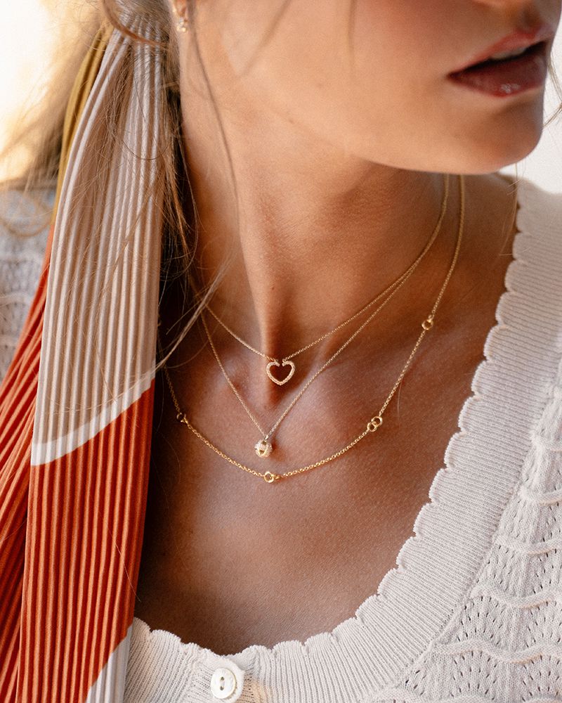 Collar de oro amarillo con colgante de corazones y diamante - 14 quilates