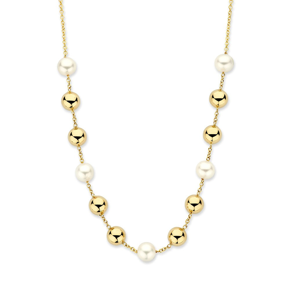 Geelgouden collier met afwisselend parels en gouden bolletjes, vervaardigd uit 14 karaat goud.