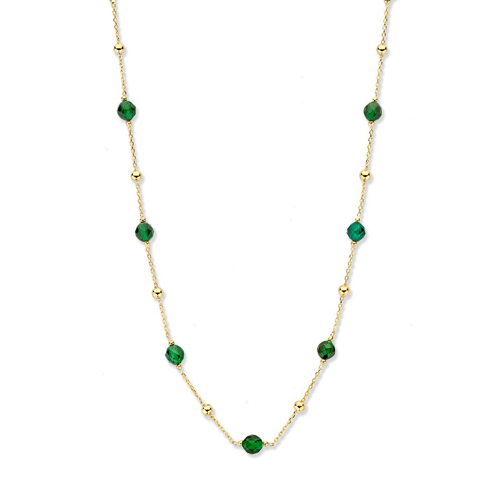 Collar de oro amarillo con bolitas doradas y de zirconia verde.