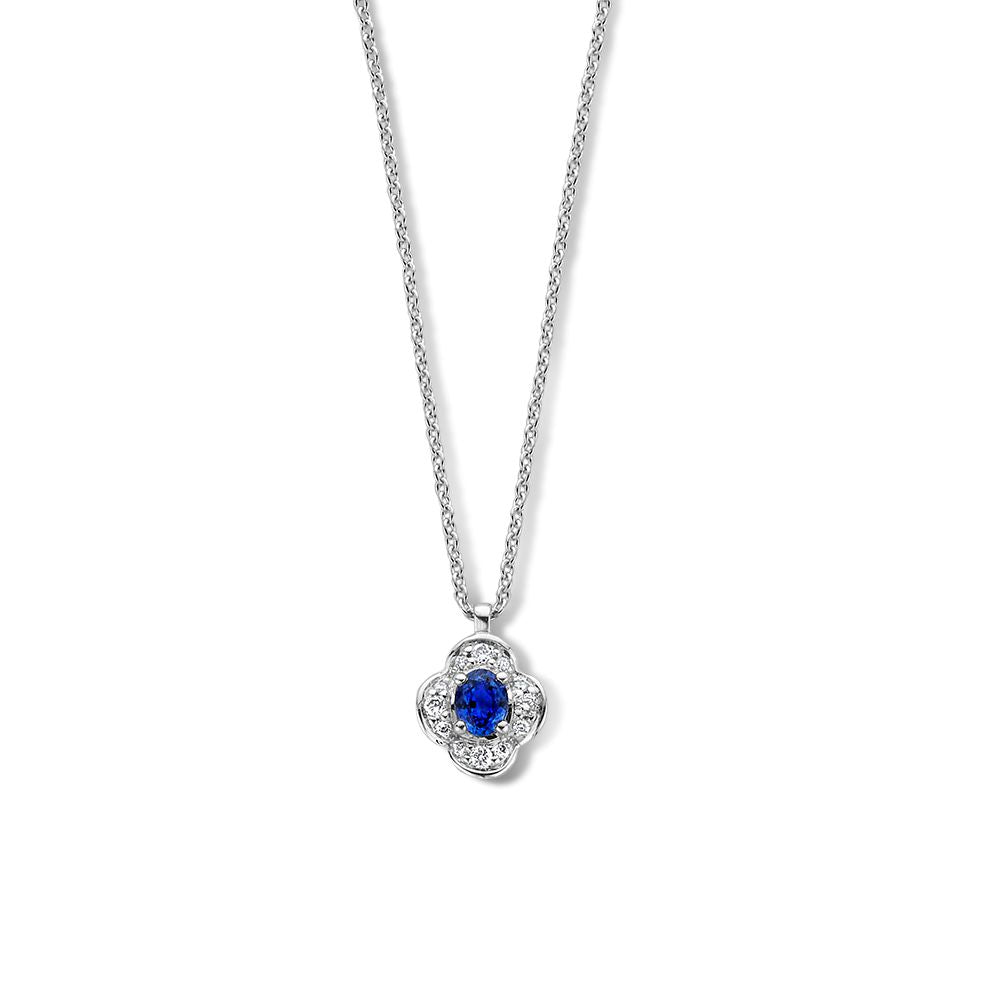 Collar de oro blanco de 14 quilates con colgante de flor, zafiro azul y diamantes.