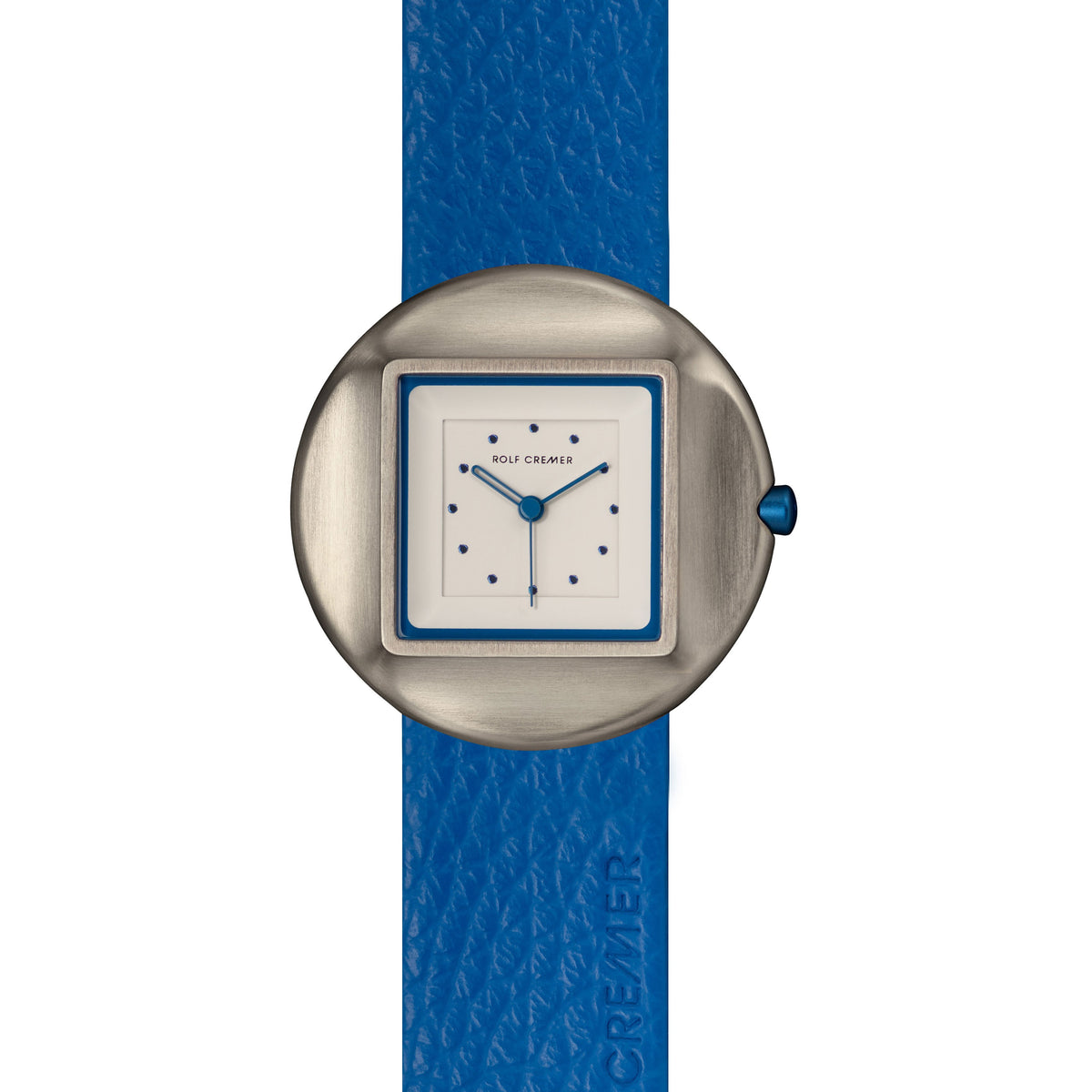 Reloj con caja plateada, esfera blanca cuadrada y correa de cuero azul texturizado.