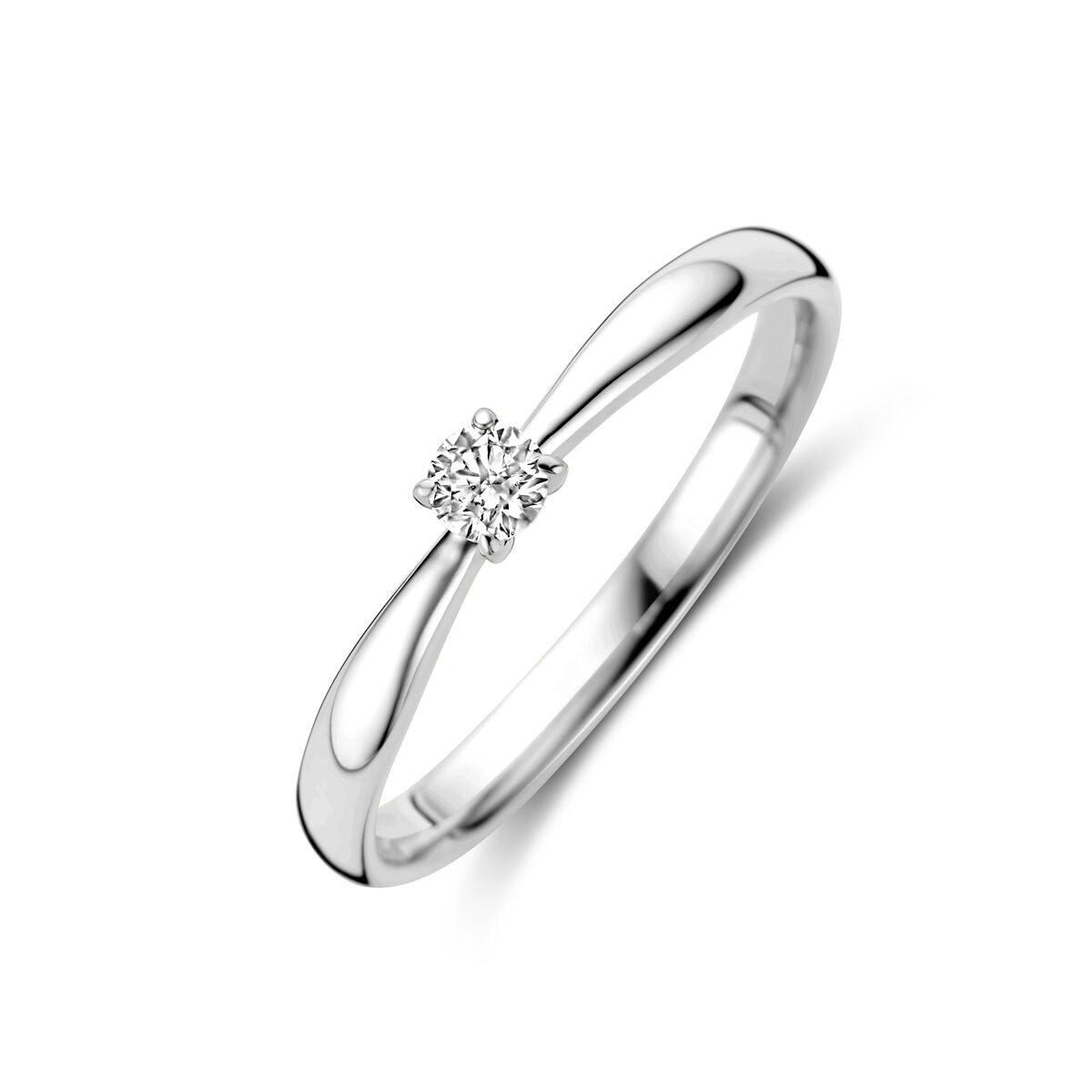 Anillo de compromiso de oro blanco de 14K con diamante de 0.10 ct en el centro.