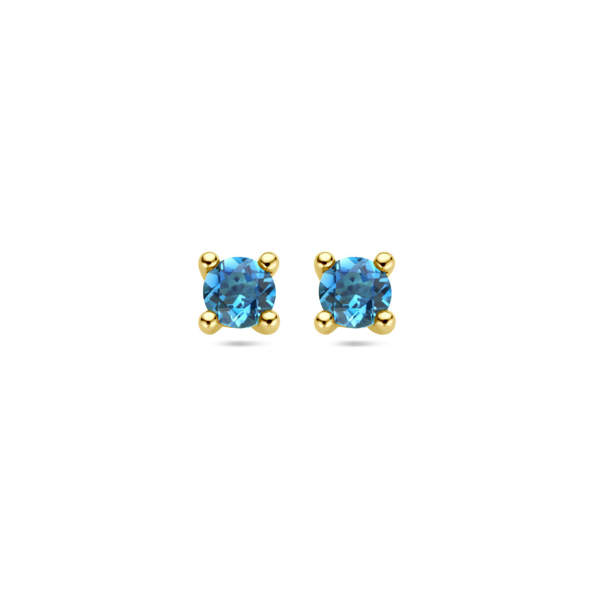 Pendientes de topacio azul londinense en oro amarillo de 14K.