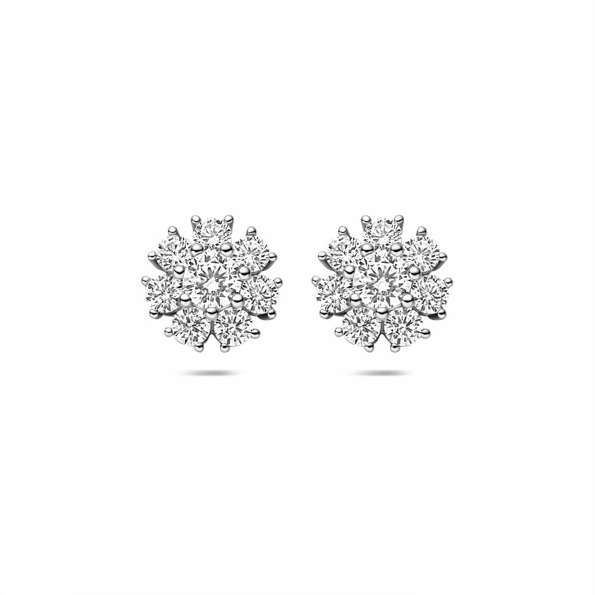 Pendientes de plata con circonitas en forma de flor, acabado en rodio.