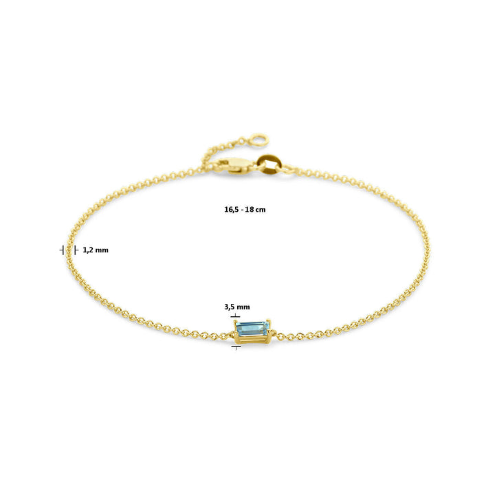 De Gouden armband dames blauw topaas 14K van Van der Kooij Collectie heeft een rechthoekige blauwe topaas (3,5 mm), fijne ketting (1,2 mm) en is verstelbaar van 16,5 tot 18 cm.