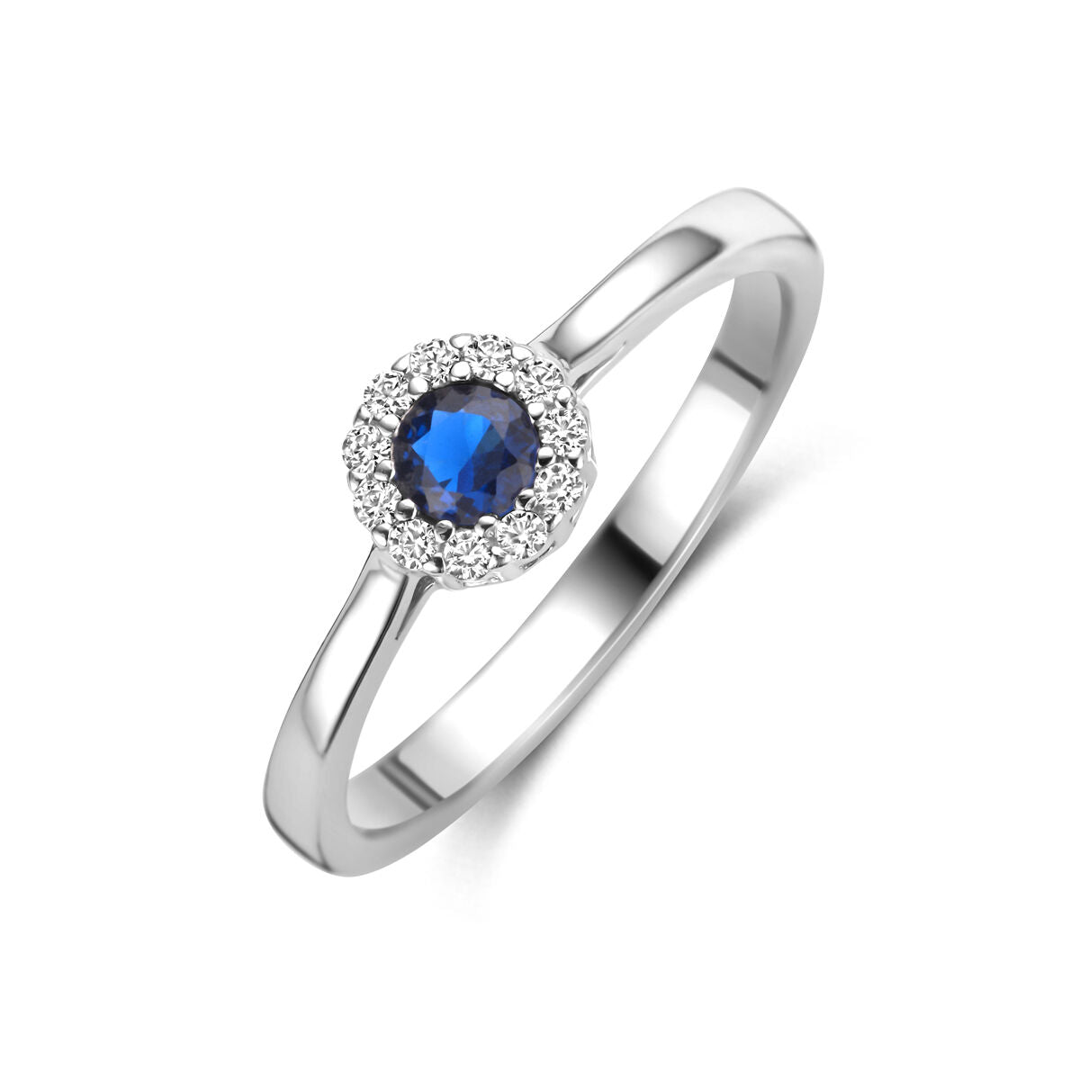 Anillo de plata rodiada para dama con zafiro y circonitas, con un diseño brillante.