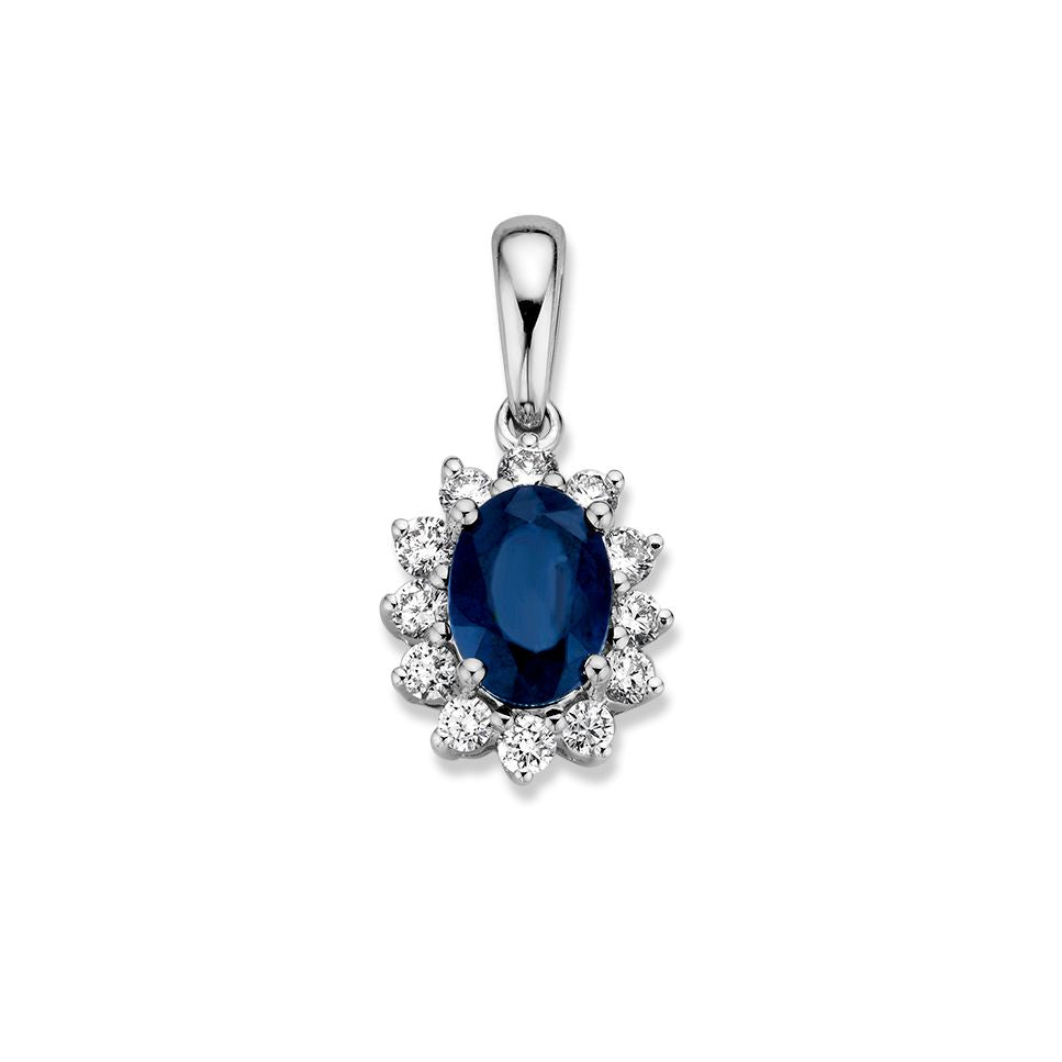 Colgante de oro blanco con zafiro azul de 1.00 crt y diamantes de 0.27 crt, forma ovalada.