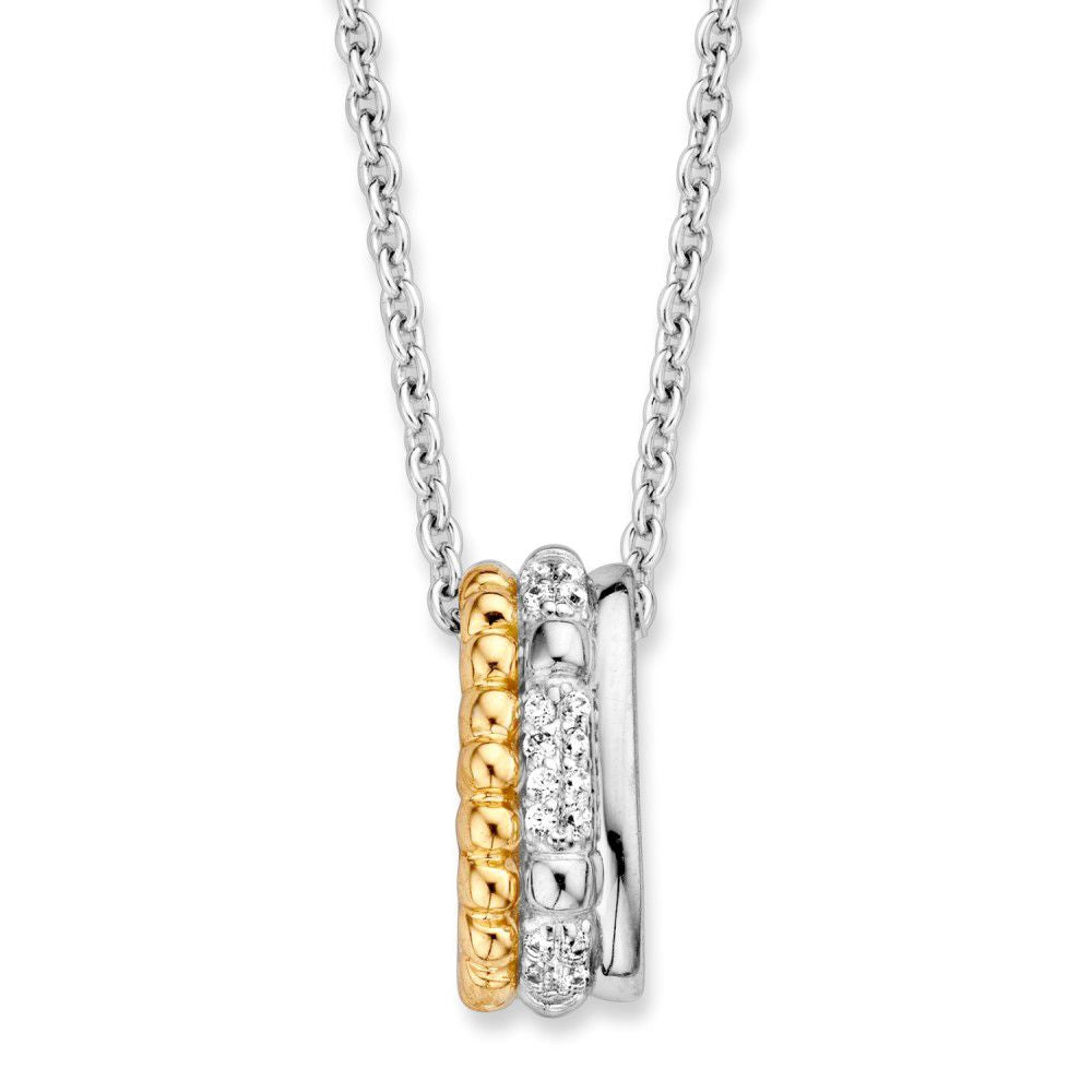 Colgante de plata y oro con circonitas blancas, de forma circular y tres anillos entrelazados.