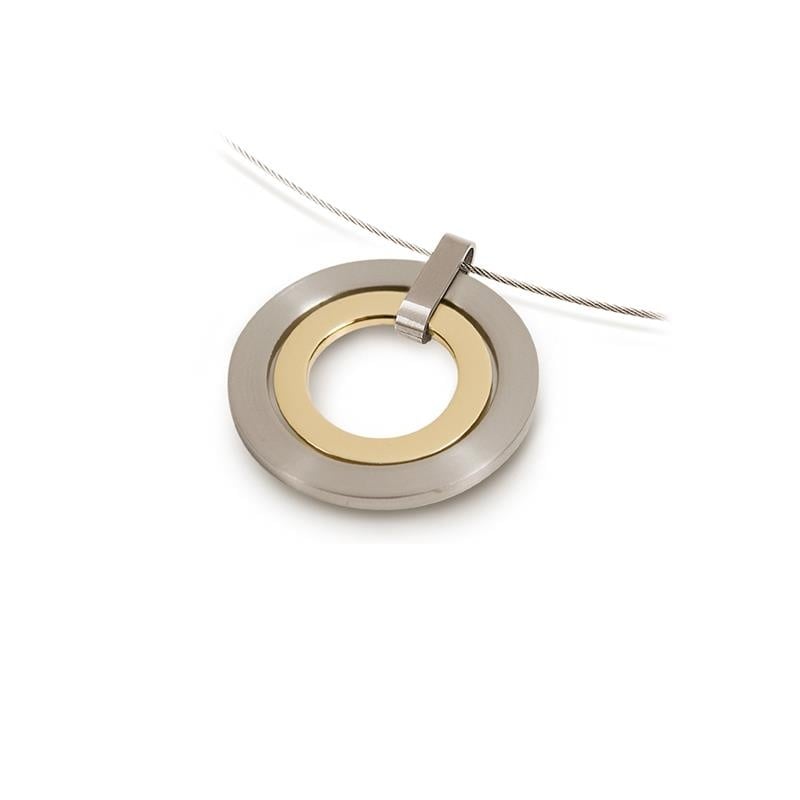 Colgante bicolor de titanio con forma circular y detalles en dorado.