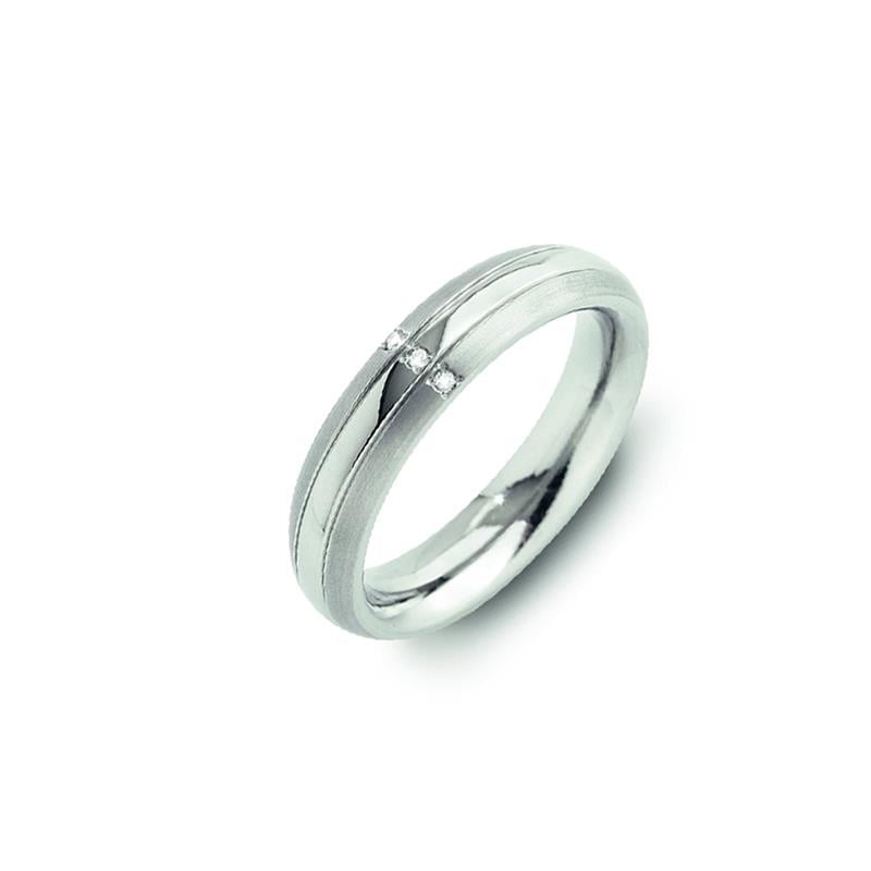 Anillo de titanio con dos diamantes, acabado pulido y diseño liso.