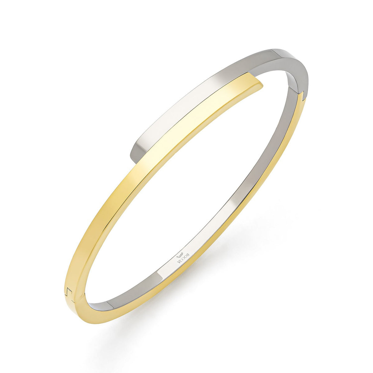 Pulsera de titanio bicolor con diseño elegante y acabado mate en tonos dorado y plateado.