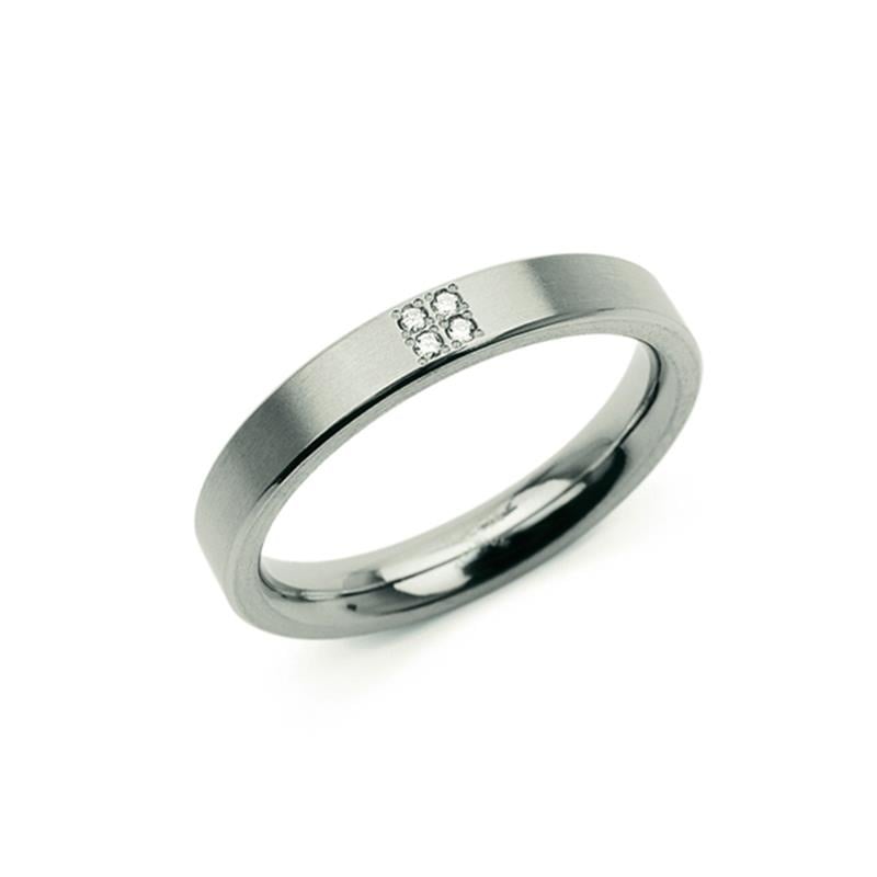 Anillo de titanio gris con un diamante de 0.02 en el centro.