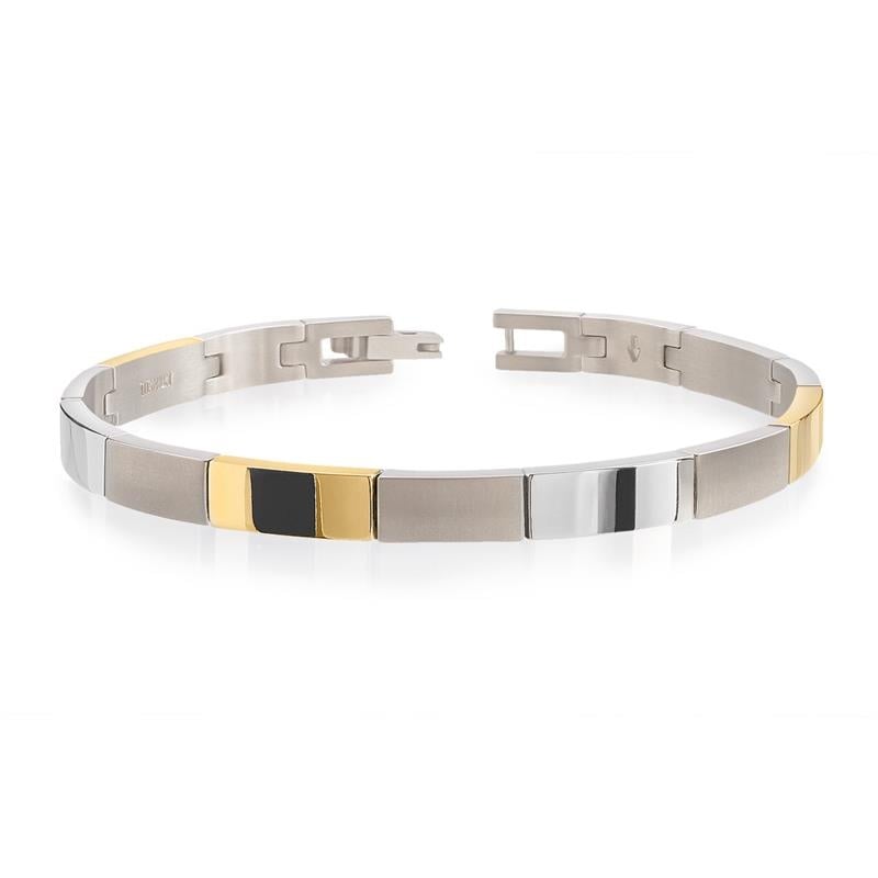Pulsera bicolor de titanio con eslabones en tonos plateado, dorado y negro.