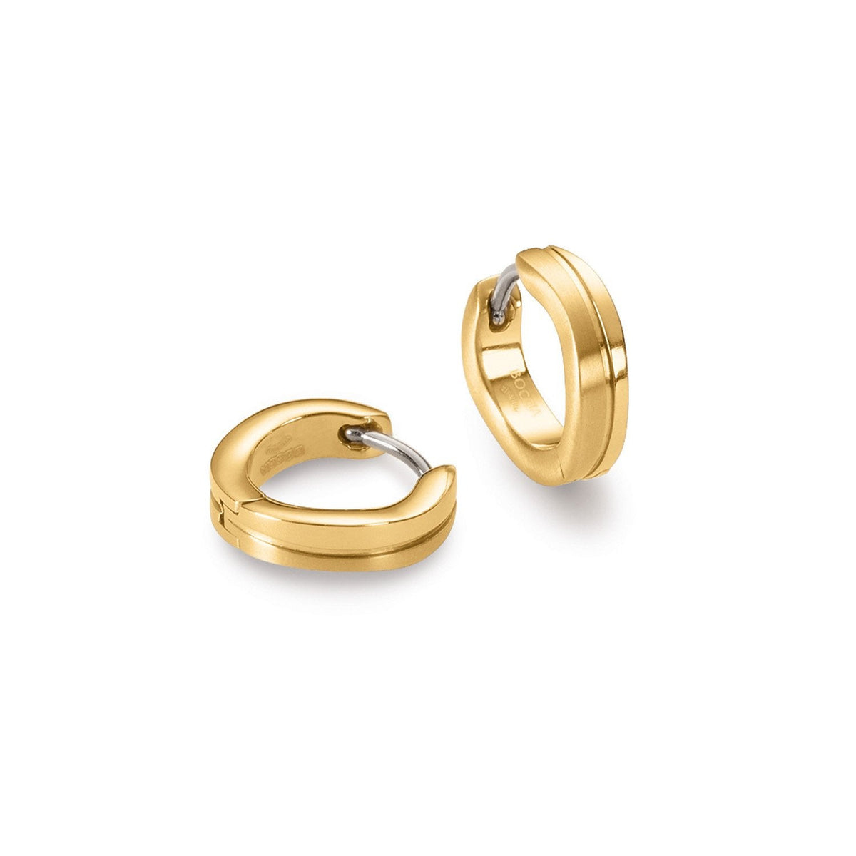 Aros de titanio dorados con un diseño moderno y acabado pulido.