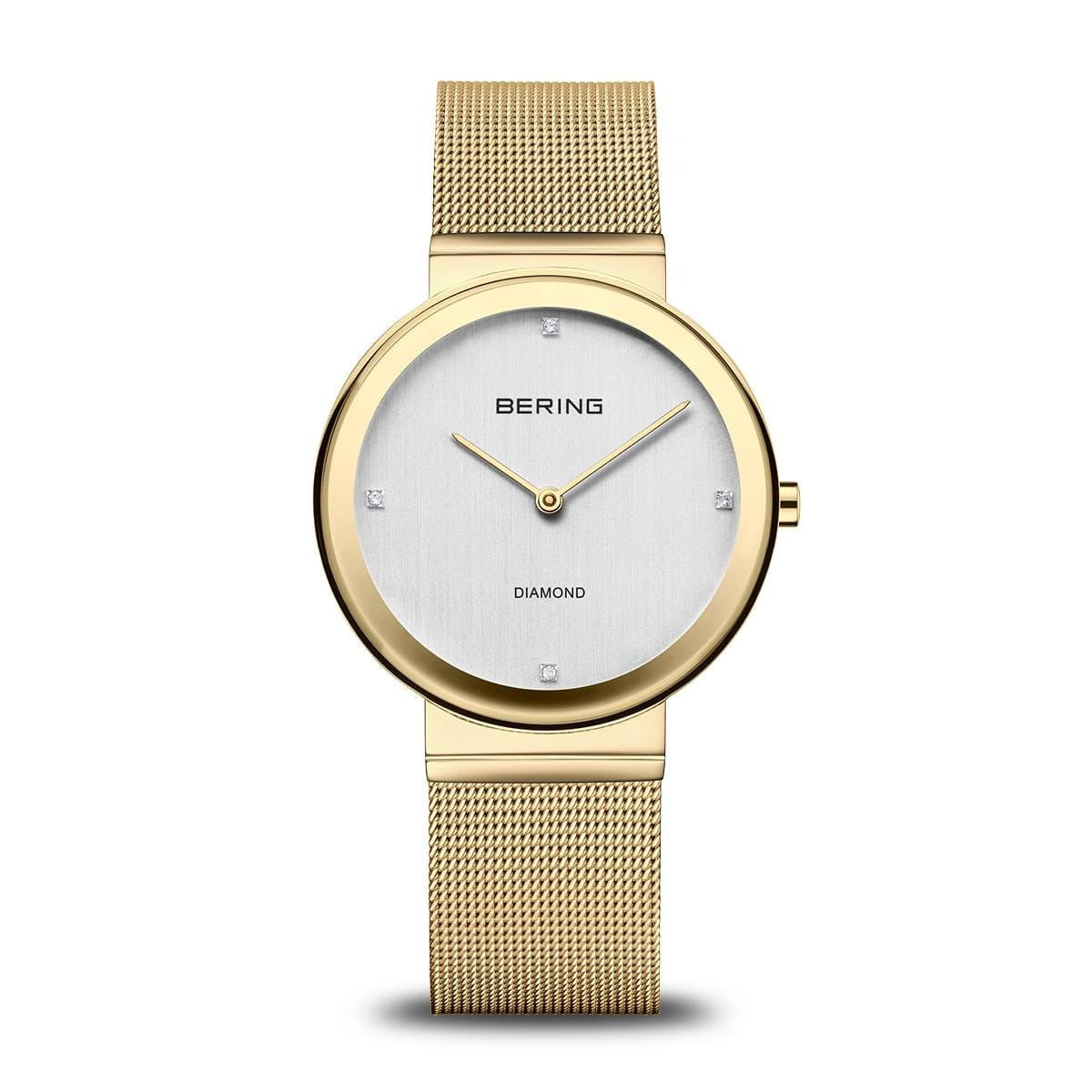 Reloj de mujer Bering con caja dorada, esfera plateada y correa de malla dorada.