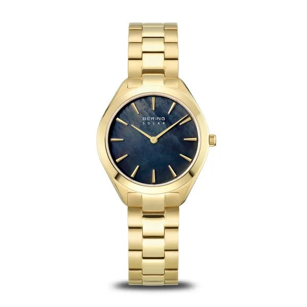 Reloj de mujer Bering con esfera de nácar azul y correa dorada.