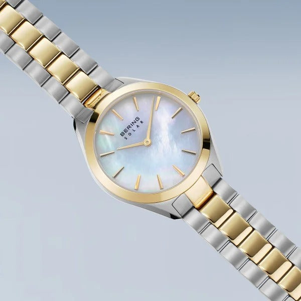 Reloj de mujer Bering – Solar, bicolor plata-oro