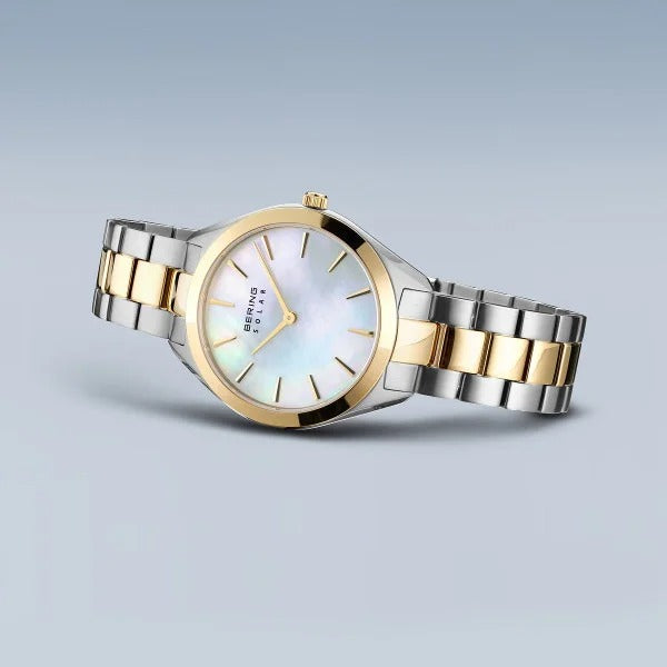 Reloj de mujer Bering – Solar, bicolor plata-oro