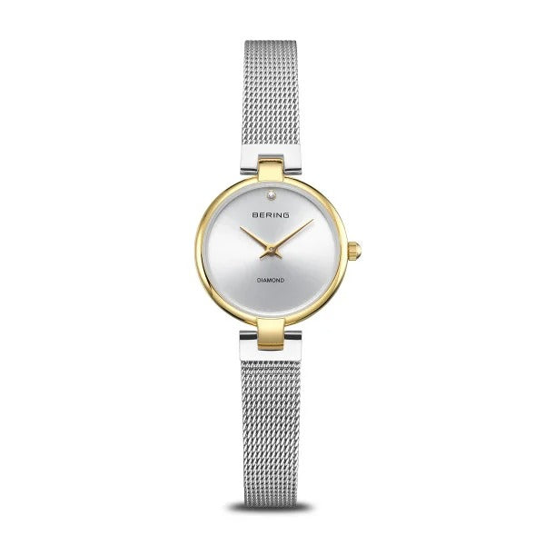 Reloj de mujer Bering, color dorado con esfera plateada y correa Milanesa plateada.