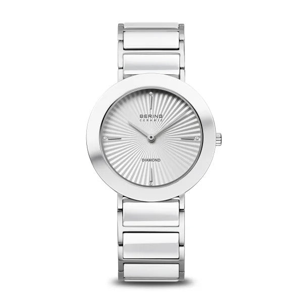 Reloj de dama Bering con caja plateada y esfera blanca de cerámica, correa de cerámica brillante.