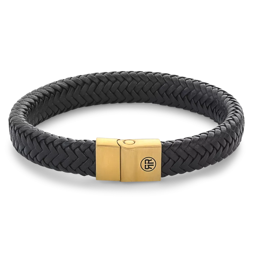 Pulsera de herringbone negra con detalles en dorado y cierre metálico.