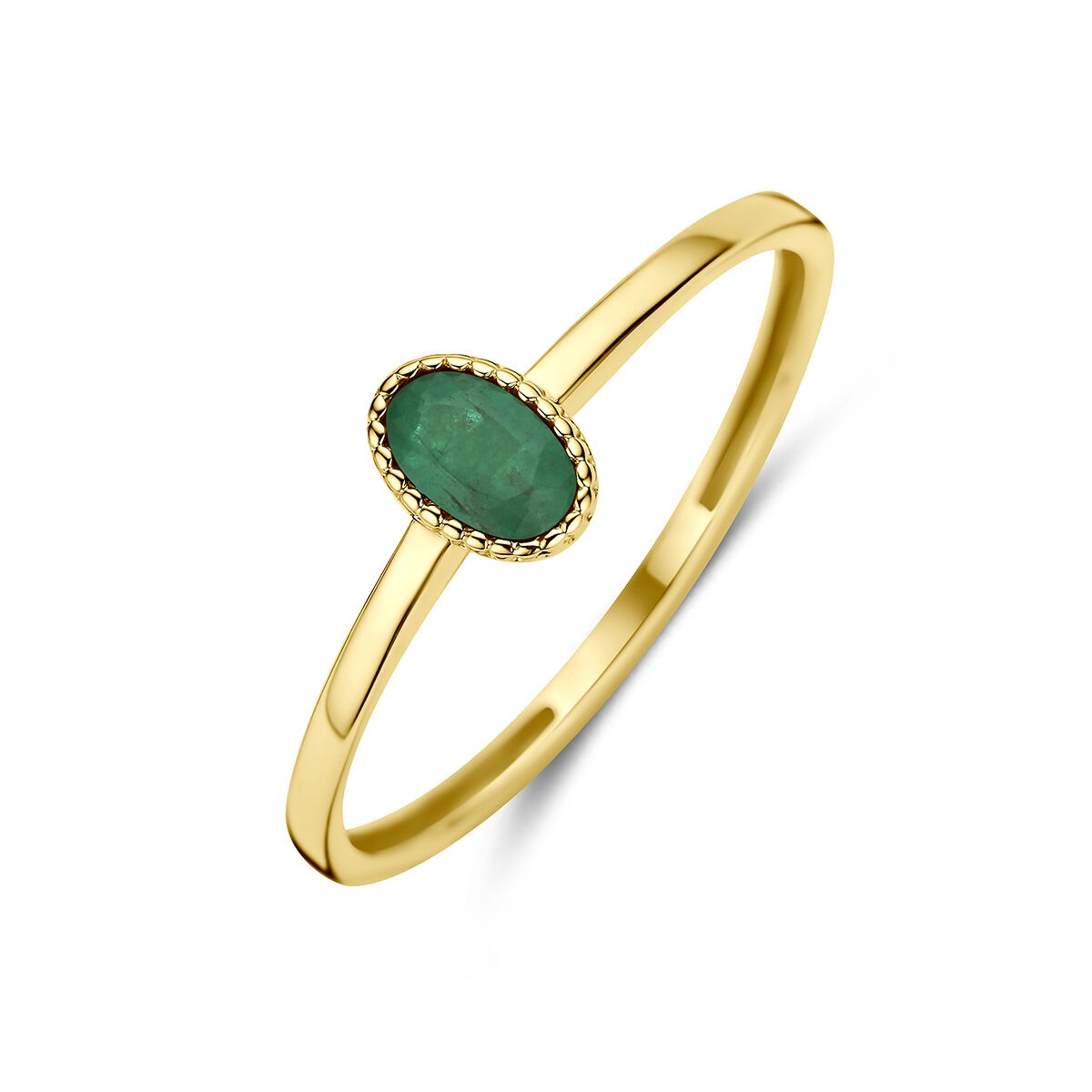 Anillo de oro amarillo de 14k con una esmeralda ovalada en el centro.