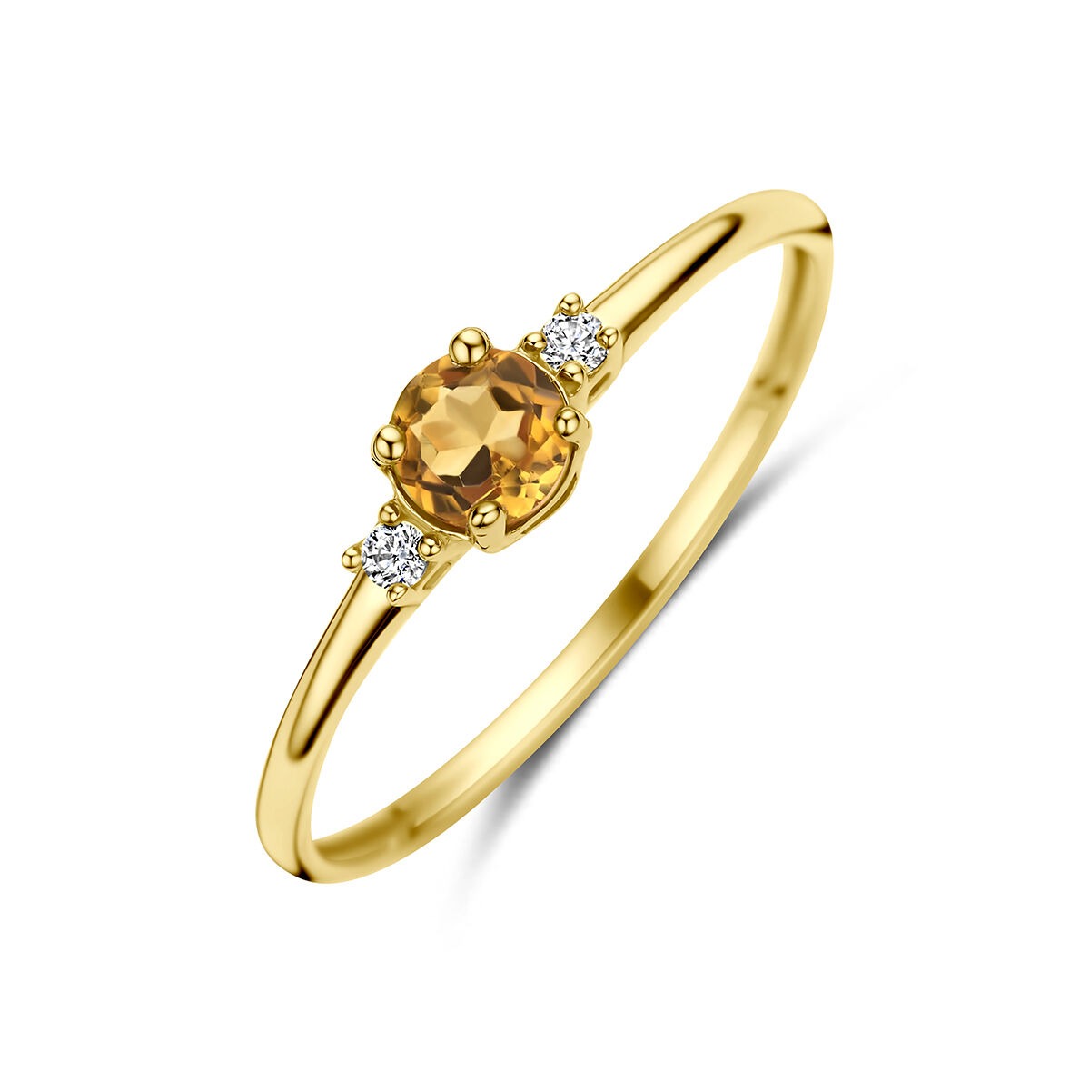 Anillo de oro amarillo de 14k con citrino central y dos zircónias a los lados.