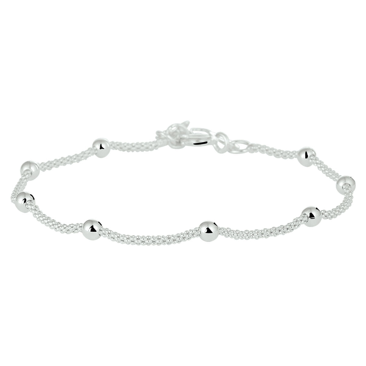 Pulsera de plata con eslabones de bolitas brillantes.
