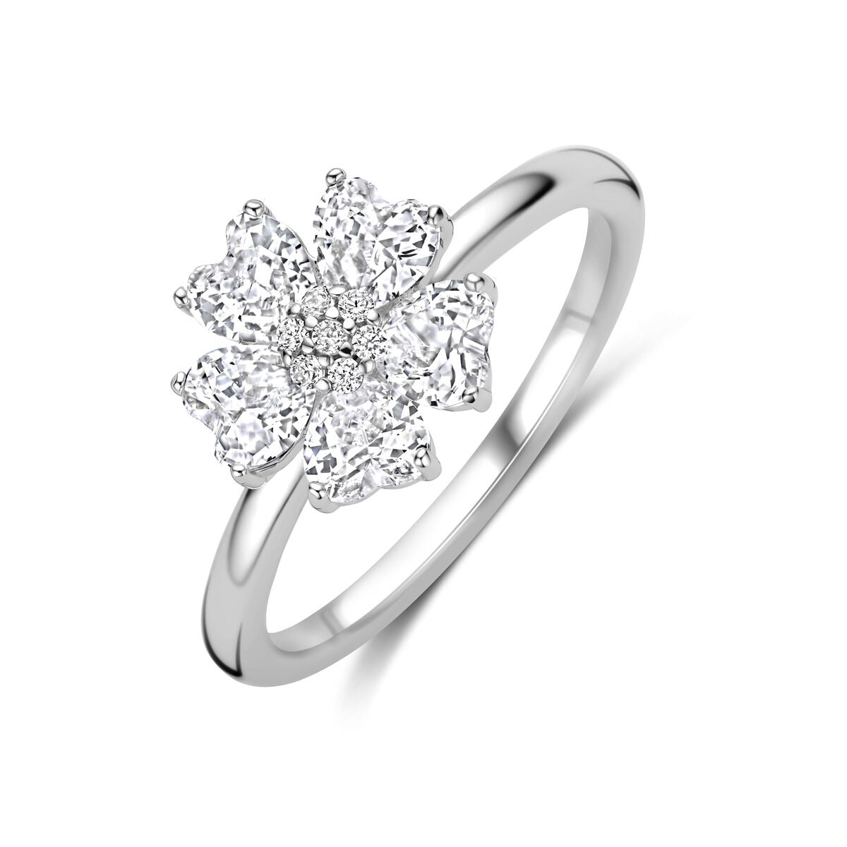Anillo de plata rodiada con un diseño de flor y circonitas en forma de corazón de 10 x 10,5 mm.