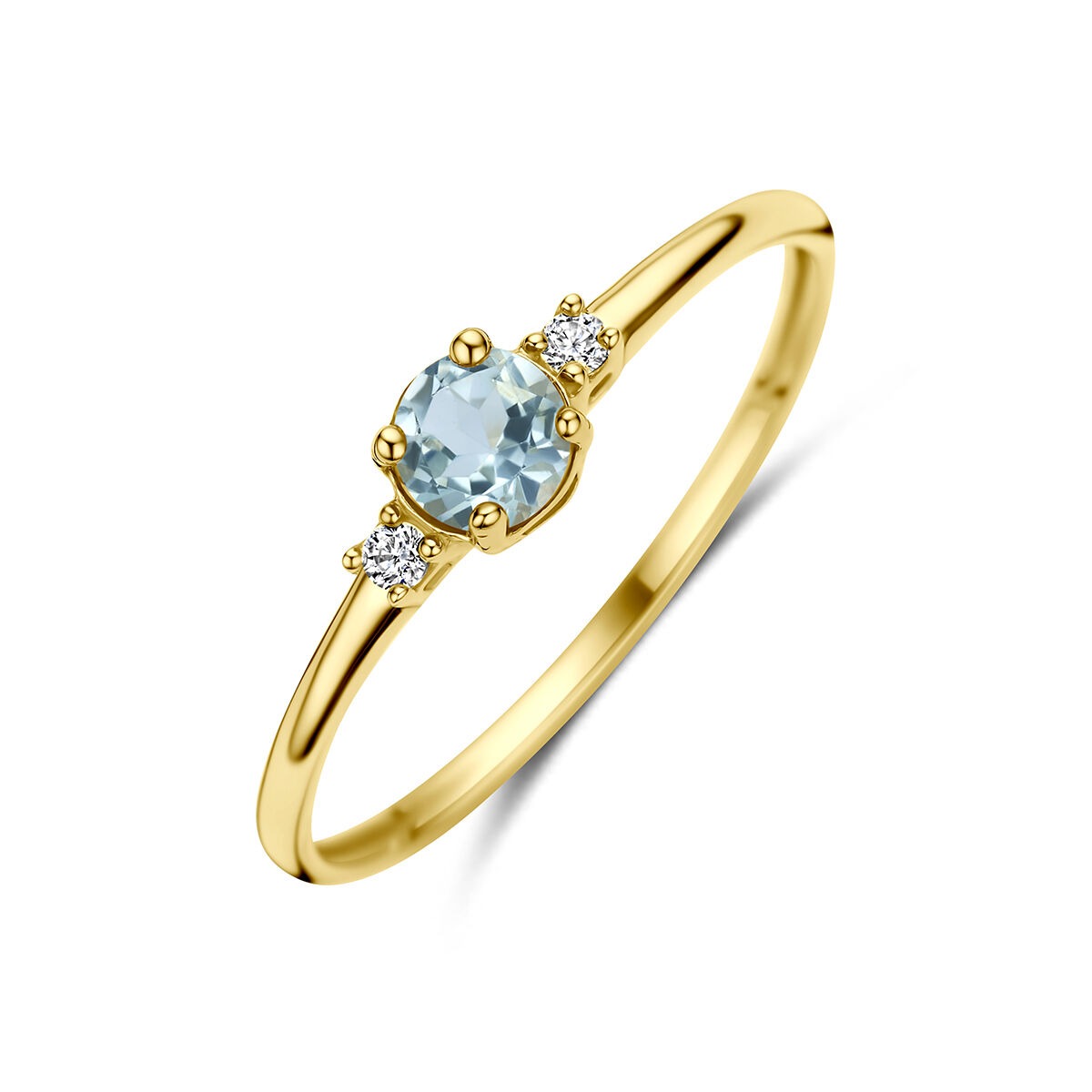 Anillo de oro amarillo de 14k con topacio azul y circonitas.
