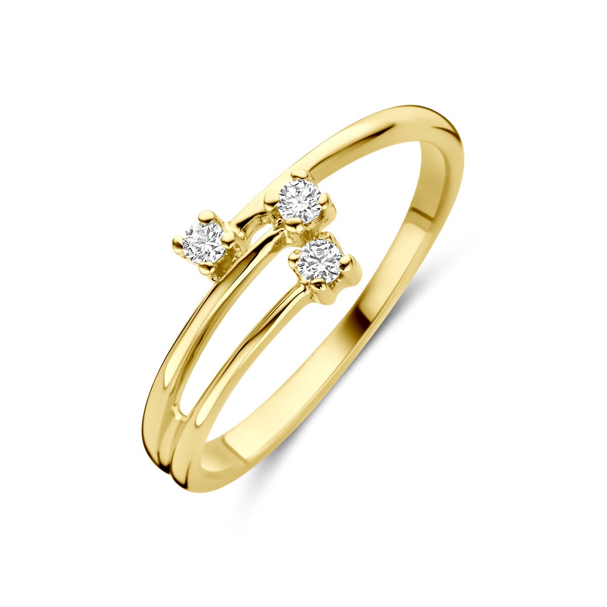 Anillo de dama en oro amarillo de 14k con tres circonitas brillantes.
