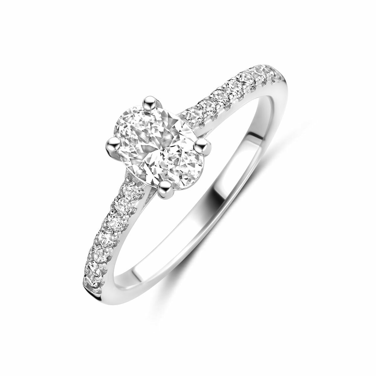 Anillo de plata de dama con zirconia ovalada y detalles brillantes en la banda.