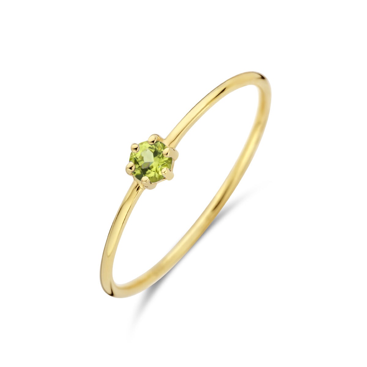 Anillo de oro amarillo de 14k con peridoto y brillante tallado.