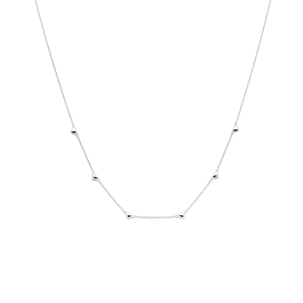 Collar infantil de plata con corazones, acabado en rodio, con pequeñas esferas decorativas.