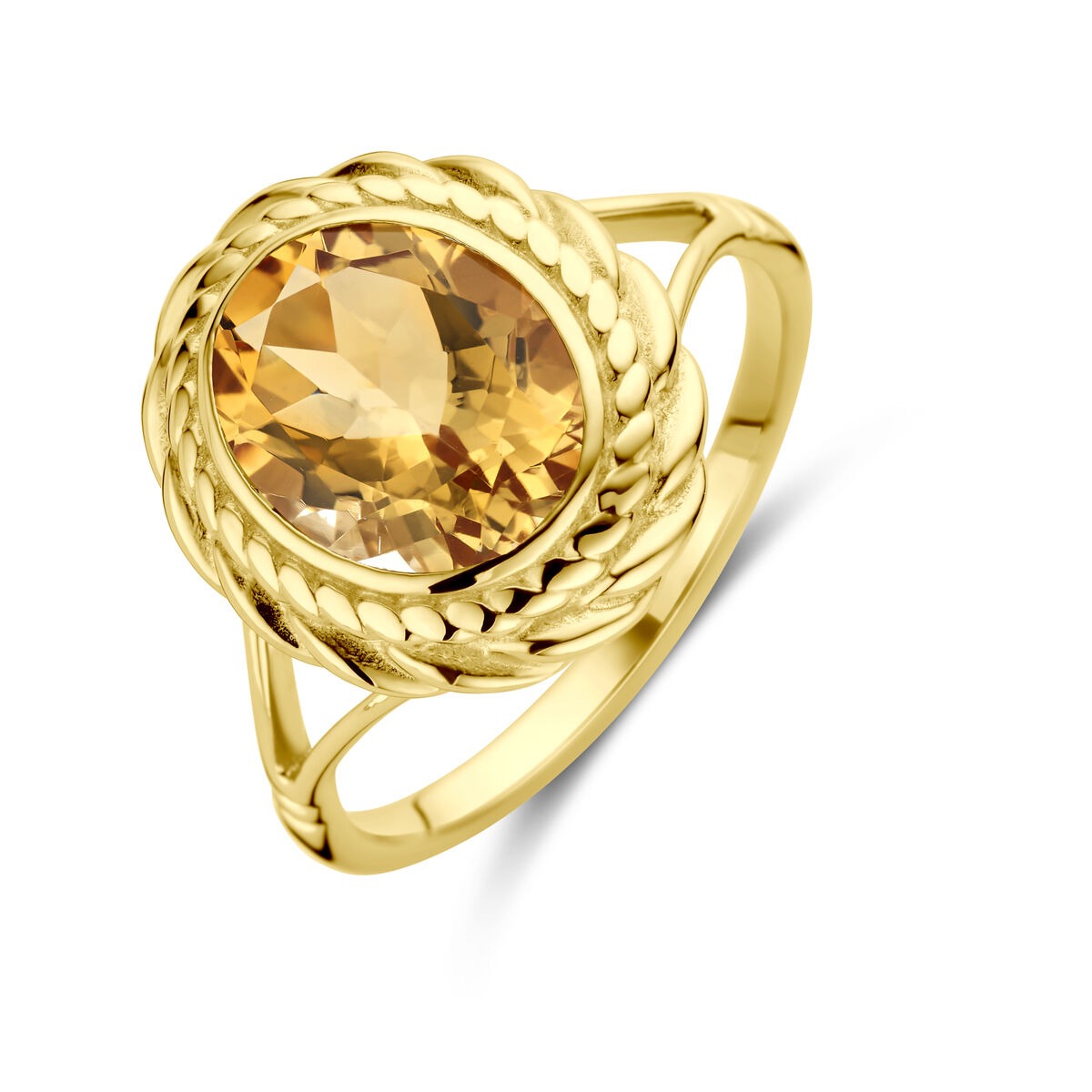 Anillo de oro de 14k con citrino en forma de briolette, con detalle trenzado en el aro.