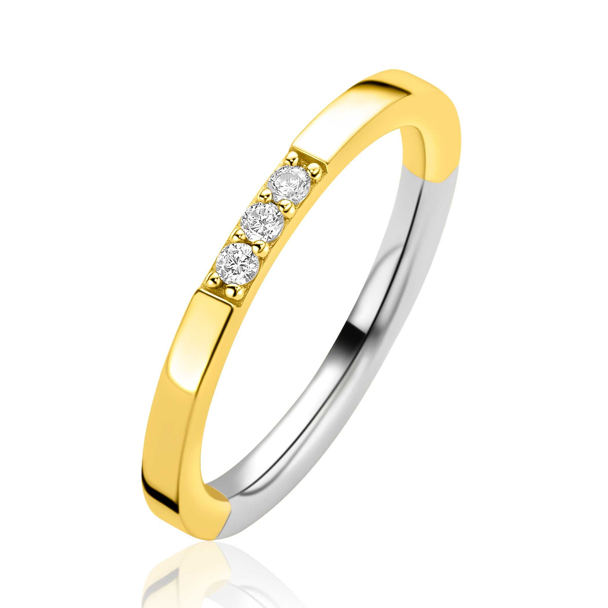 Anillo dorado con tres piedras brillantes y acabado plateado en los laterales.